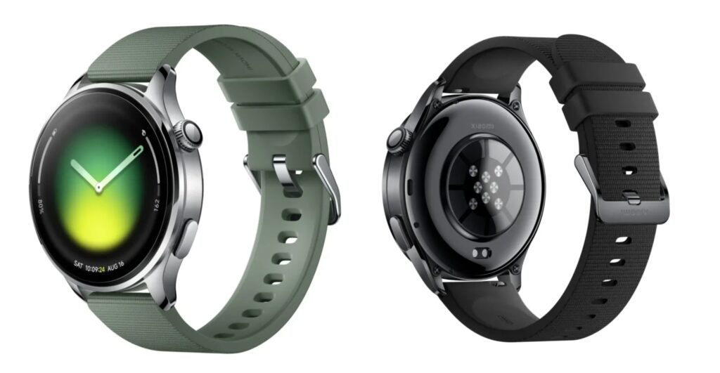 alt="Visão detalhada de dois smartwatches Xiaomi Watch 5 lado a lado num fundo branco; à esquerda, o modelo com pulseira verde exibe a tela AMOLED ligada, e à direita, o modelo preto destaca os sensores de saúde e o design premium da parte traseira."